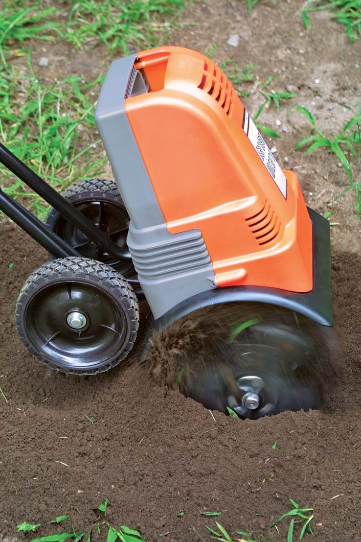 using a tilling machine to remove grass