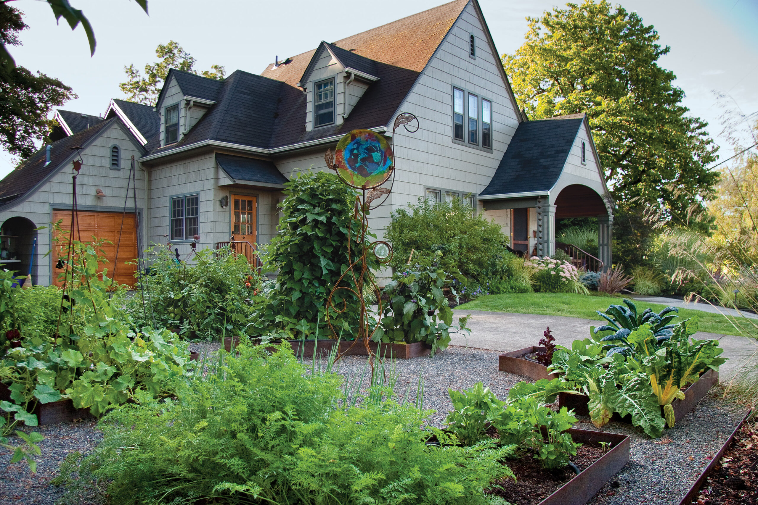 House with garden beds outfront 