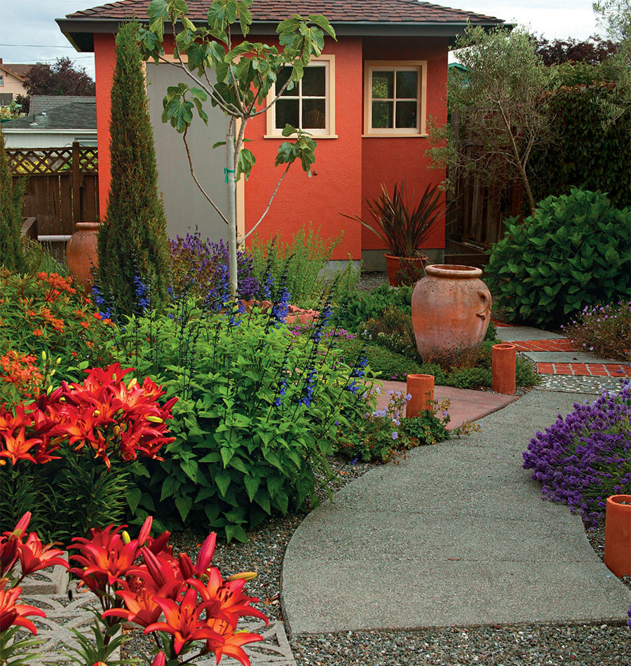 Brick accents and terra-cotta pots were added to the existing concrete walkways with a utility shed painted red to match the hardscaping color