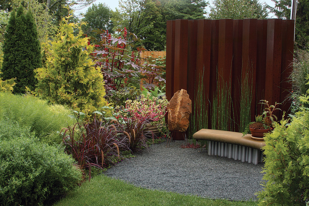 Golden arborvitae, 'Fireworks’ purple fountain grass, rough horsetail