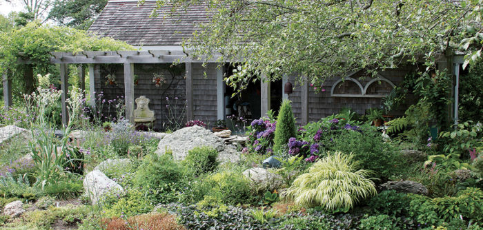 a pergola connected to the house, transitioning from the complete enclosure of the home to the openness of the outdoors.