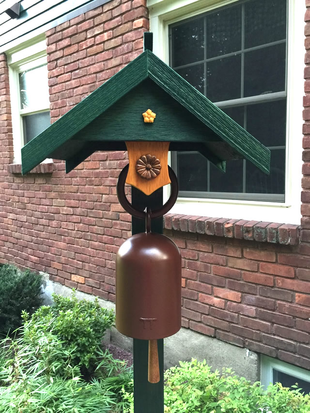 Garden art in front of a window