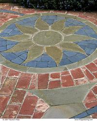 mix and match colorful materials; a gold sun against blue with red brick around it