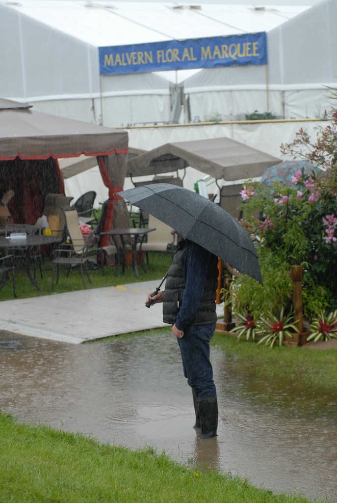 Man standing in a big puddle