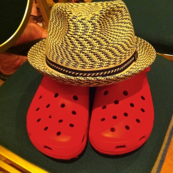 red crocs with a hat