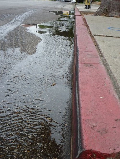 water flowing through the street 