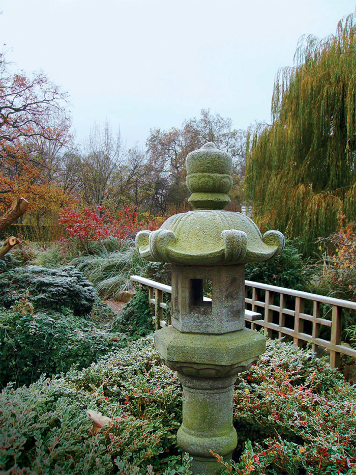 japanese stone statues in landscape