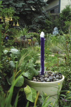 close up of moving water in a container in the garden