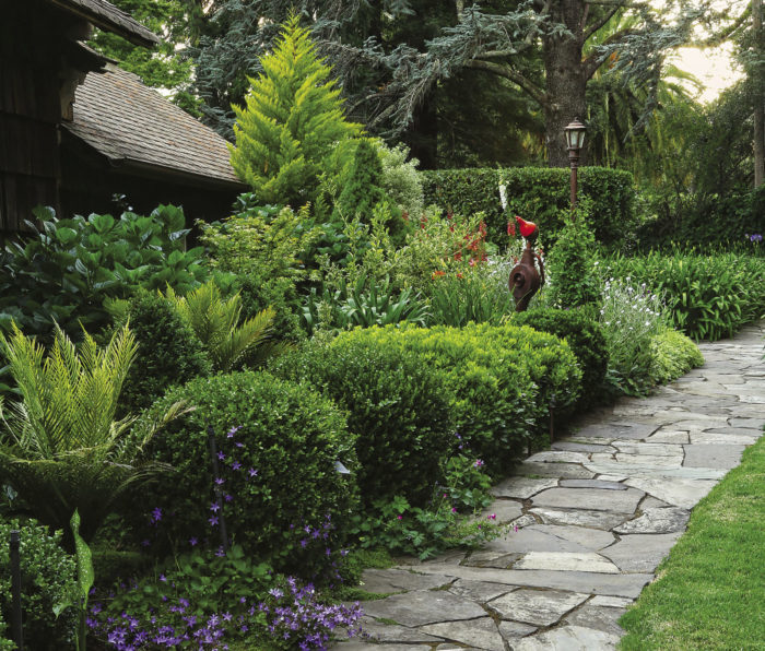 foundation bed along with path filled with plants