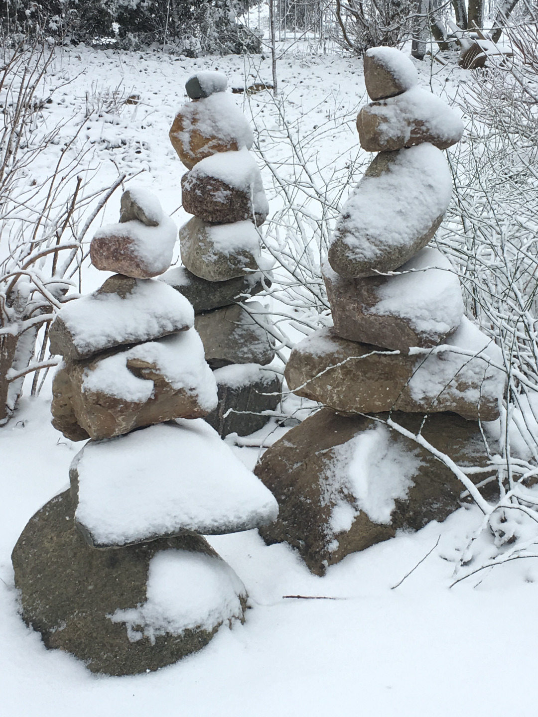 stacked stones in the snow