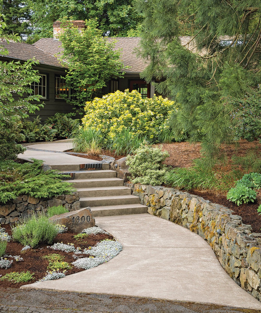 concrete path and steps leading to house