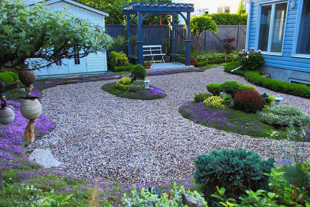 wide shot of garden with gravel paths