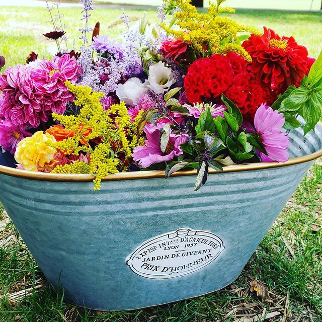 bucket full of cut flowers