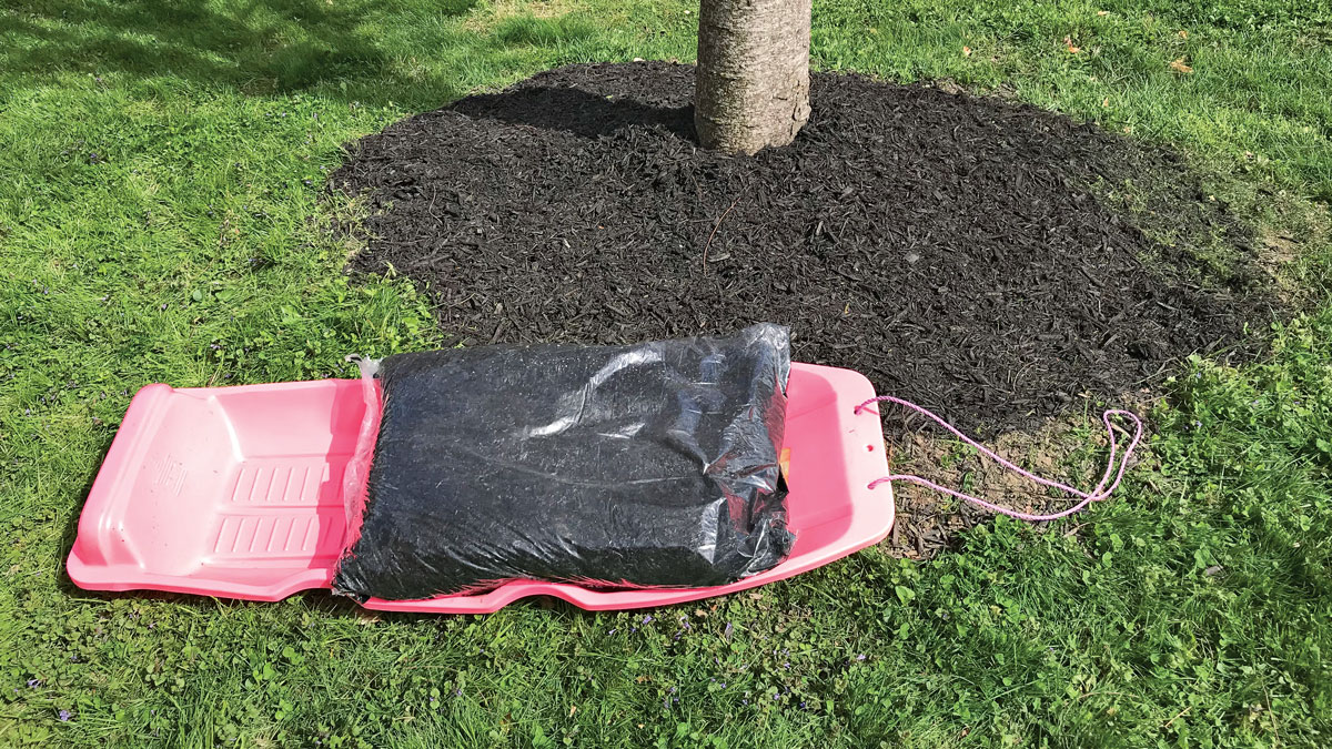 Move mulch with a sled