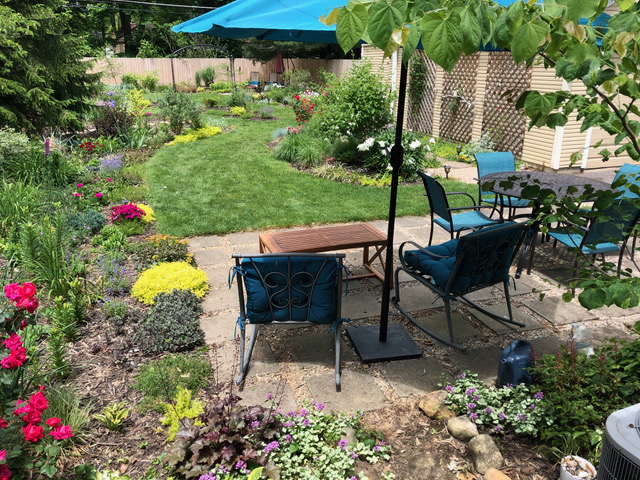 back yard patio looking out to garden and lawn