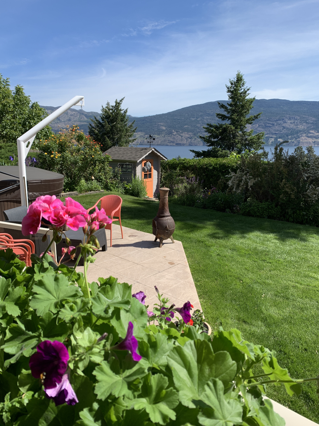 garden patio looking out on water and mountains