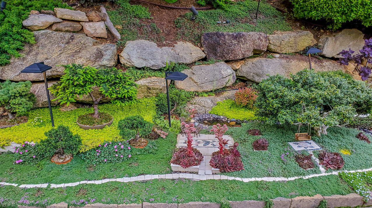 mini garden with tiny path and mini seating areas