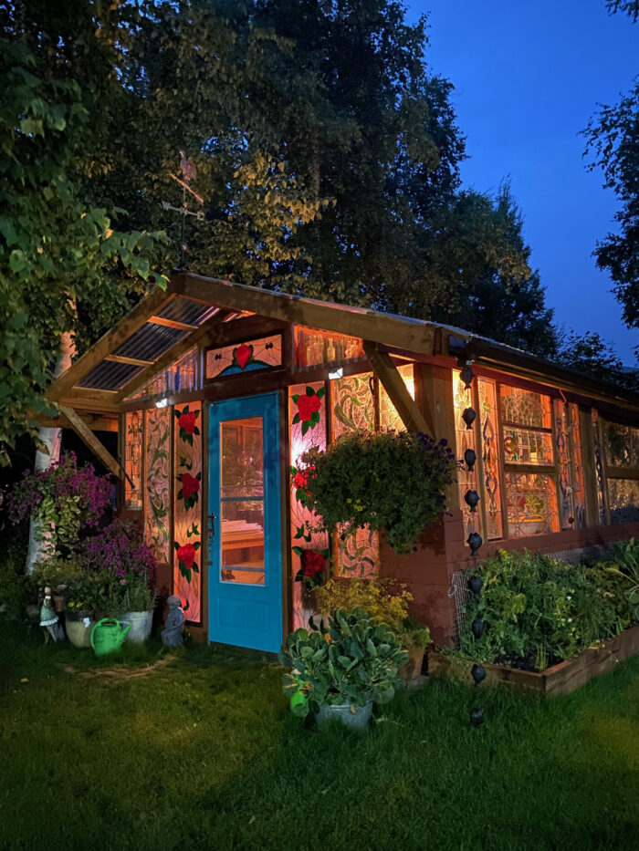 greenhouse lit up at night