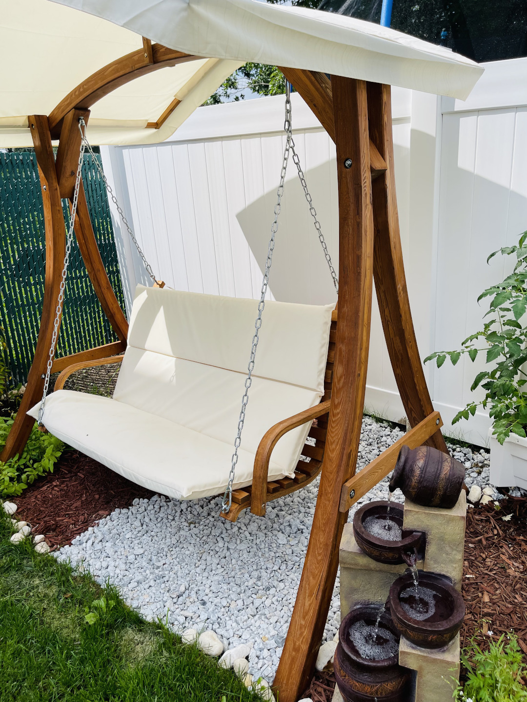 place to sit and enjoy the garden with a water feature