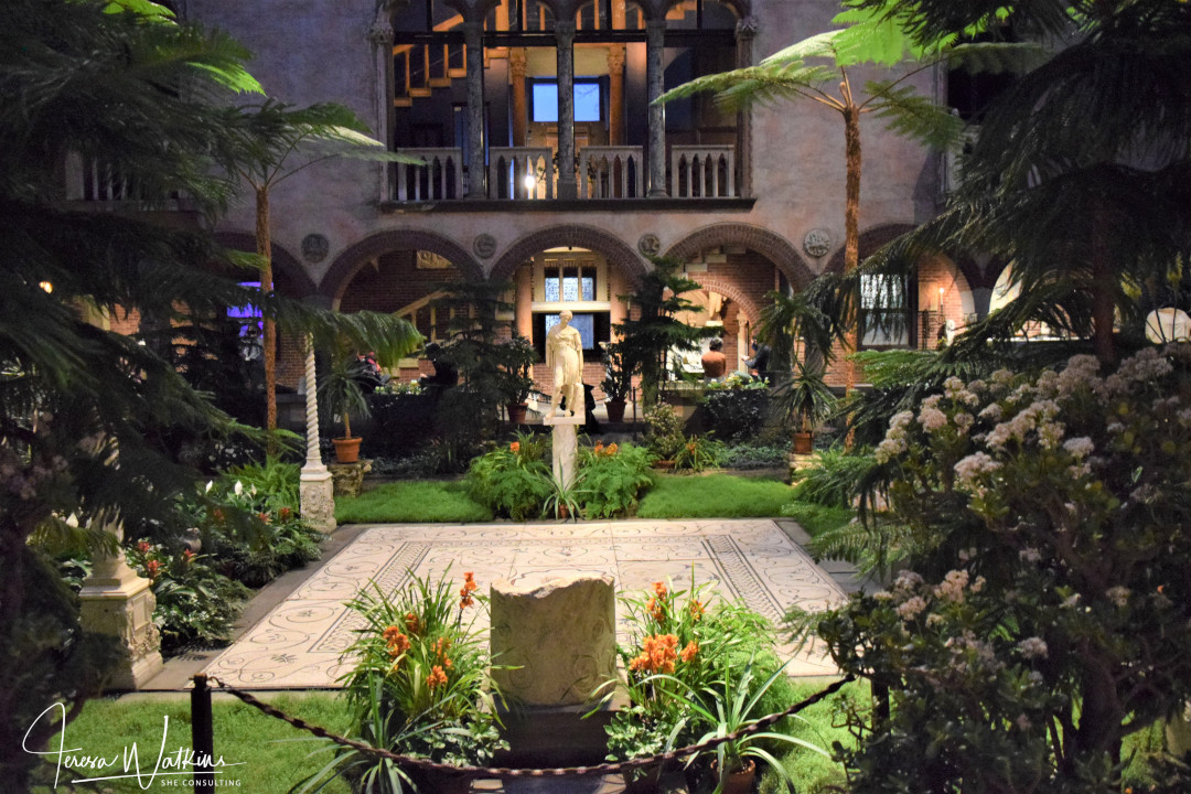 As dusk falls, lighting transforms the courtyard