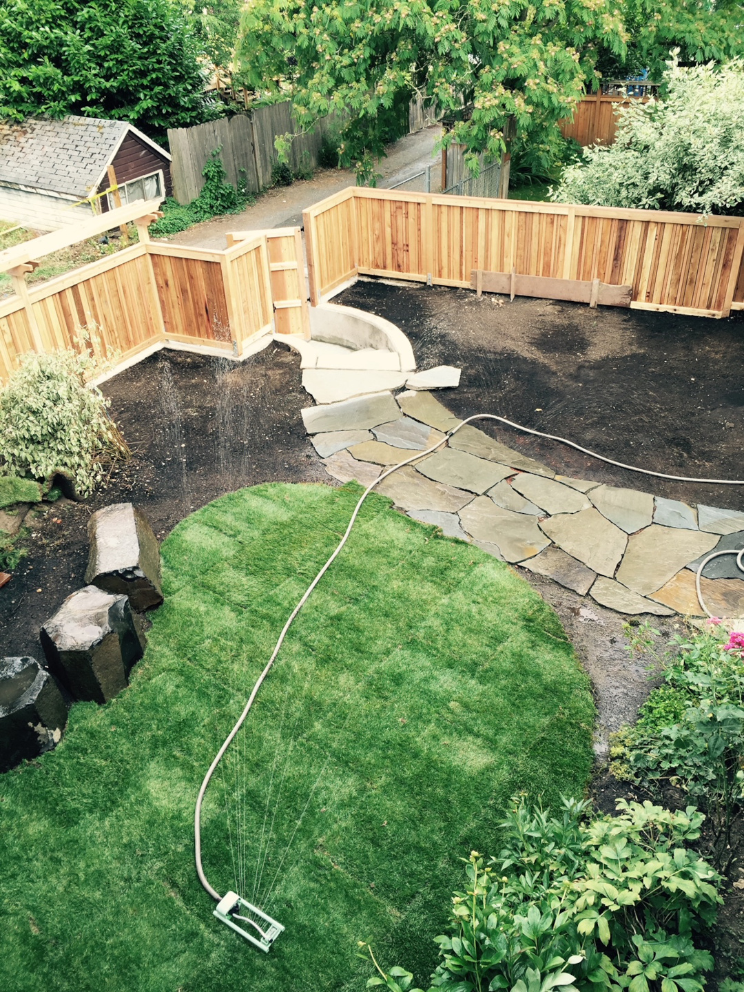 wooden gate and rock pathway installed