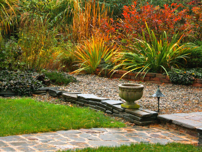 garden bed full of bright, colorful foliage plants