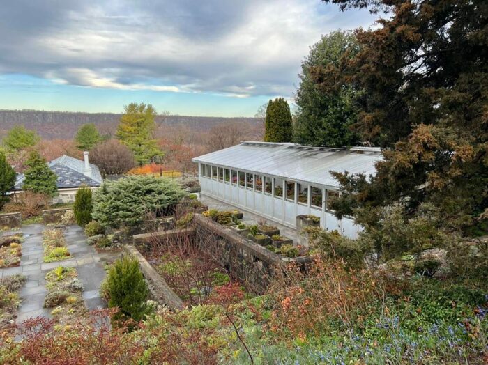 wide view of wave hill alpine house