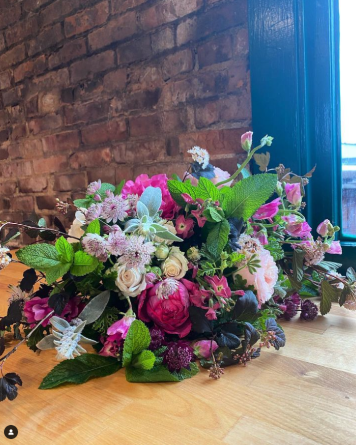 large bouquet of pink, purple, and white flowers