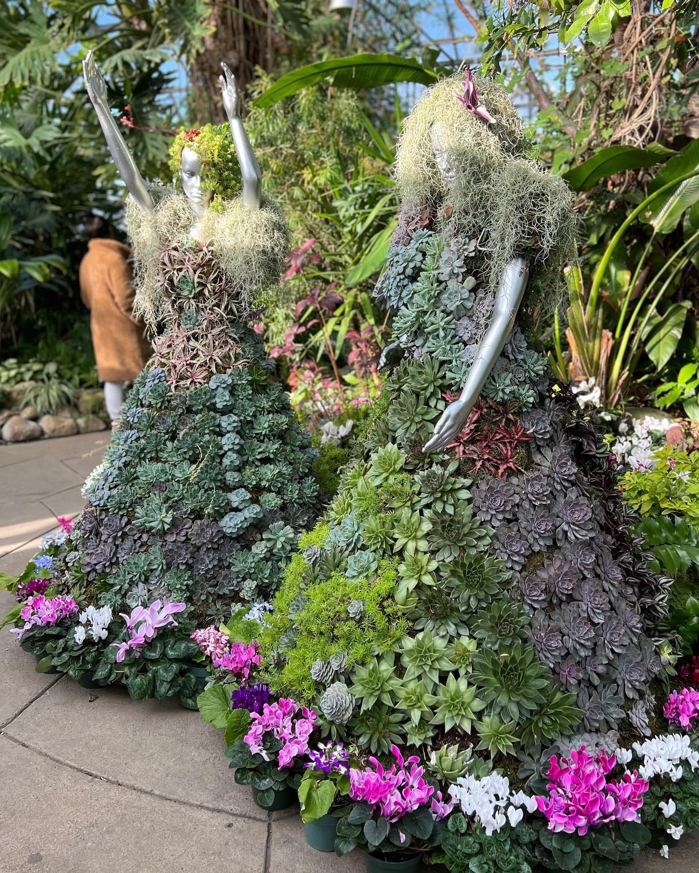 botanical mannequins covered in succulents and spanish moss