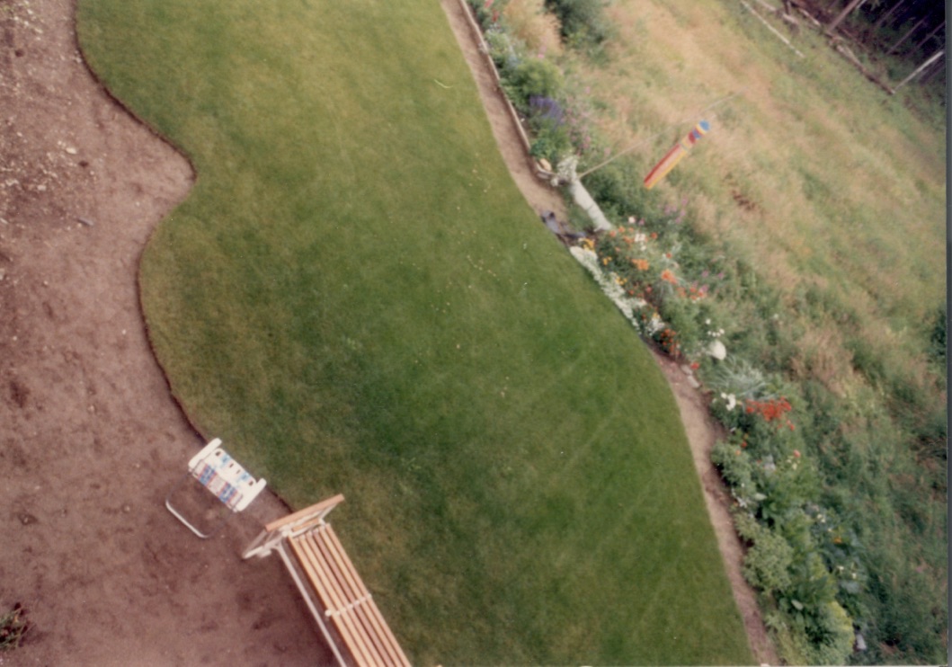 beginning of garden in Alaska that is mainly lawn