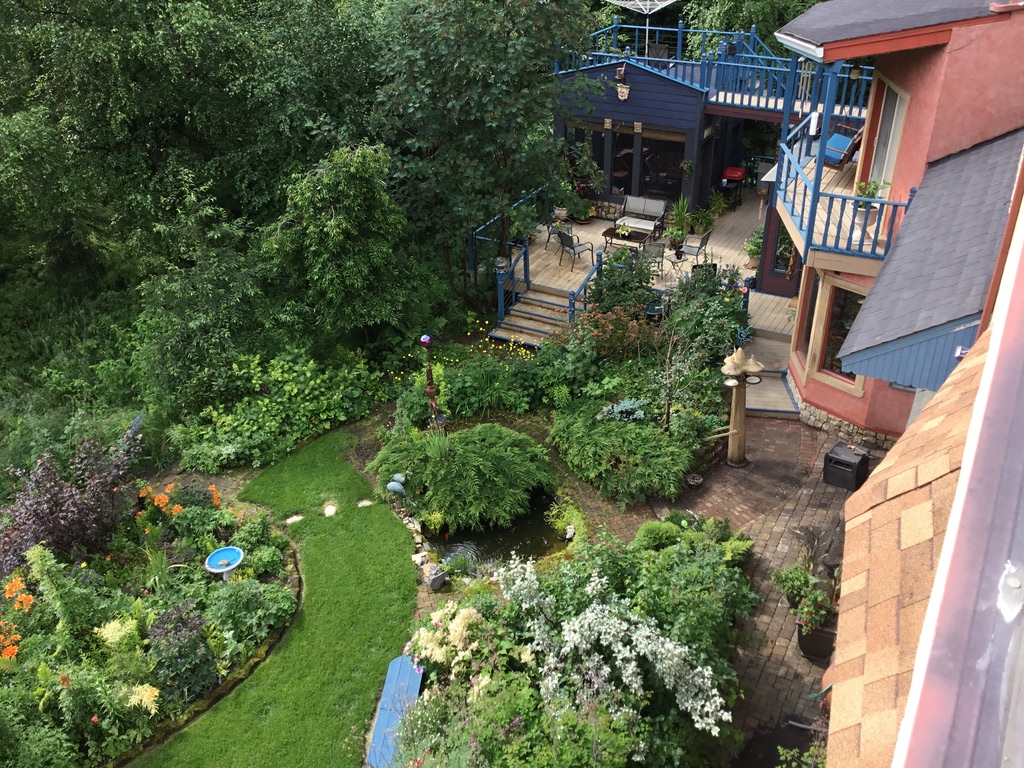 view of garden from balcony of house