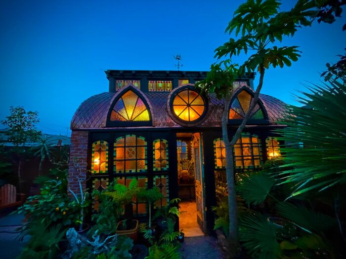 stained glass greenhouse at night