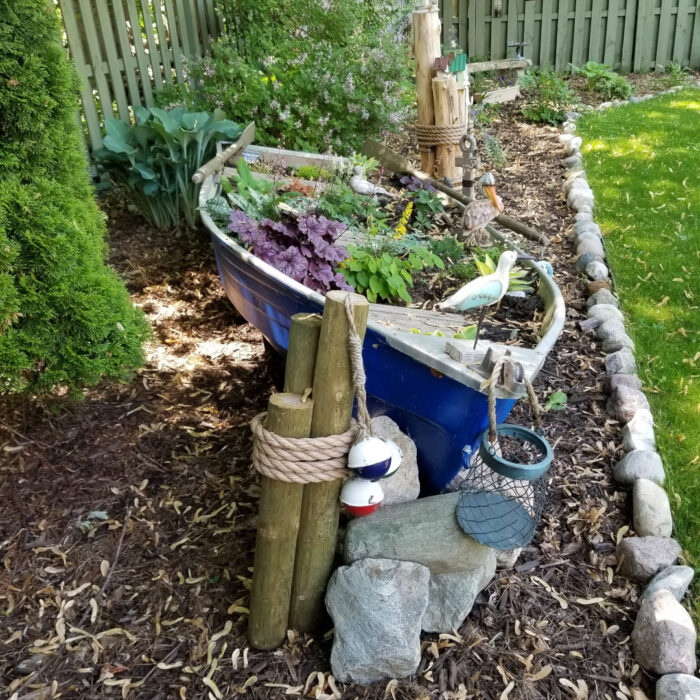 old row boated turned into a garden bed