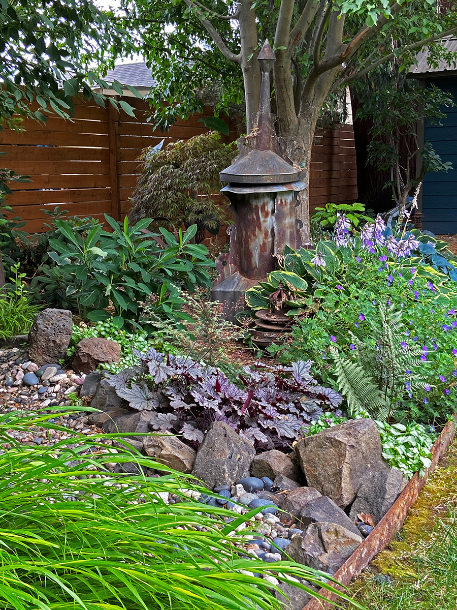 shade garden with various foliage plants