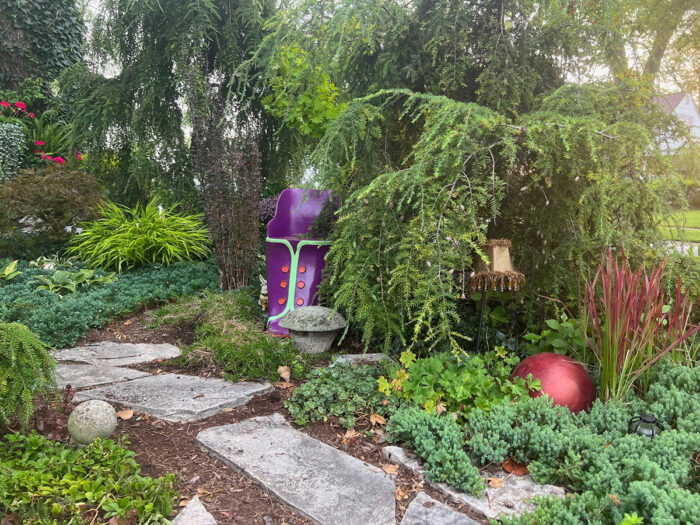 shoe chair in garden as art