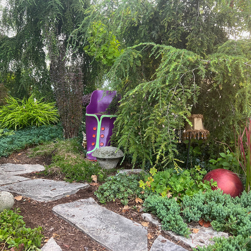 shoe chair in garden as art