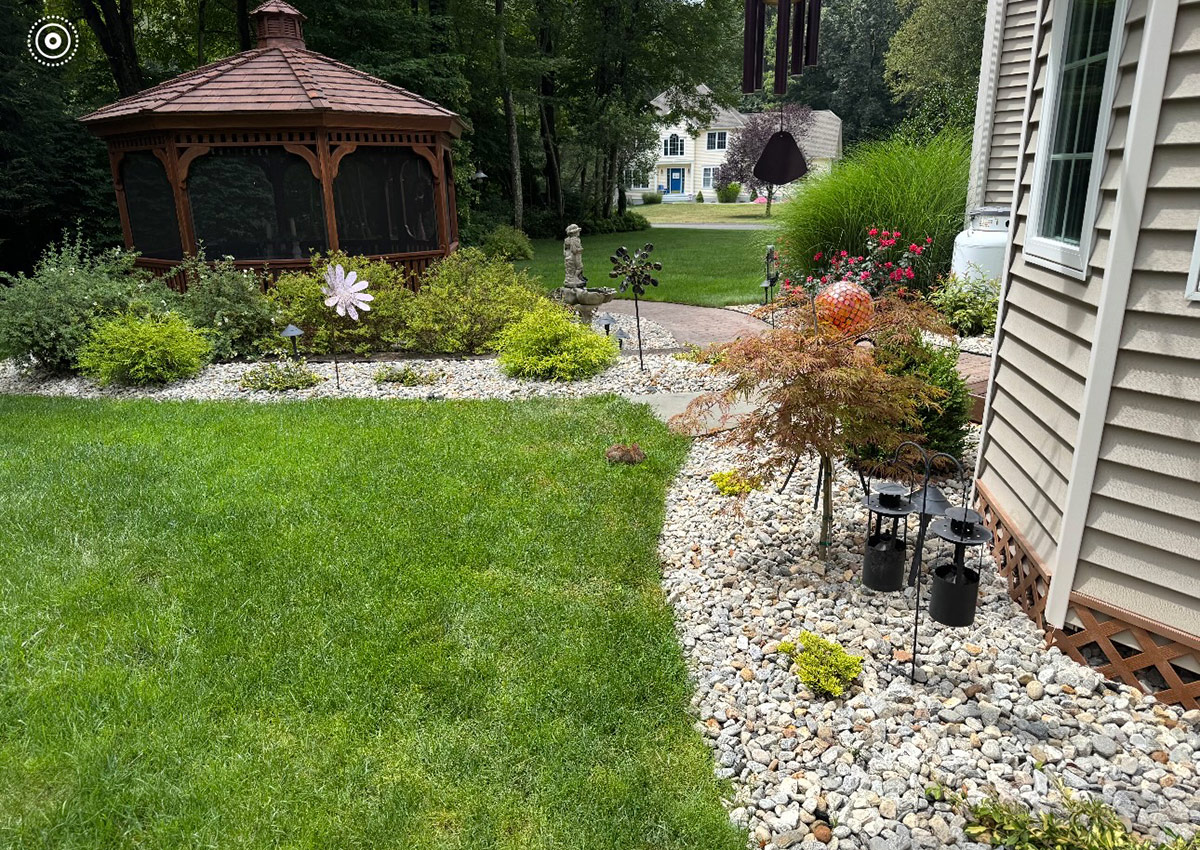 Gazebo with gravel garden bed
