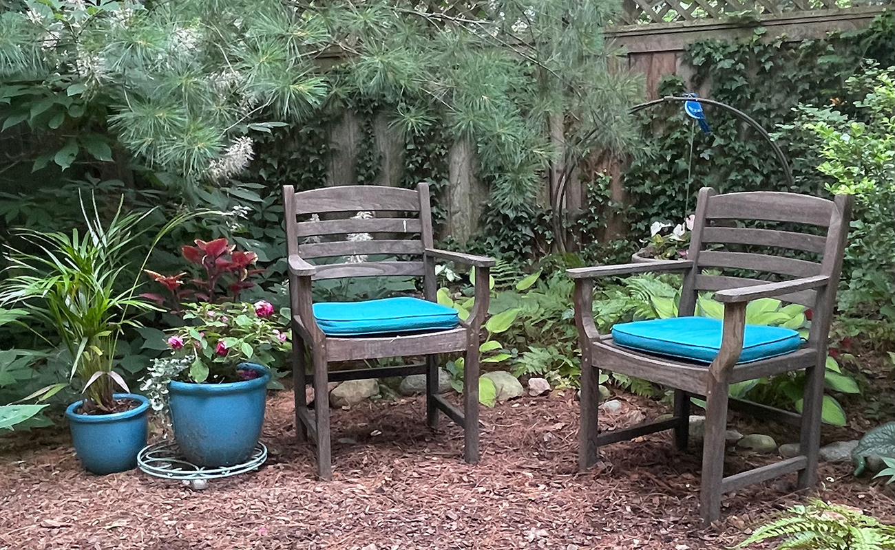 wooden chairs in a garden