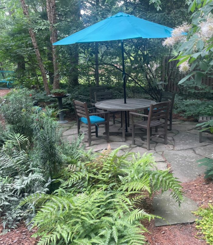 sitting area in shade garden