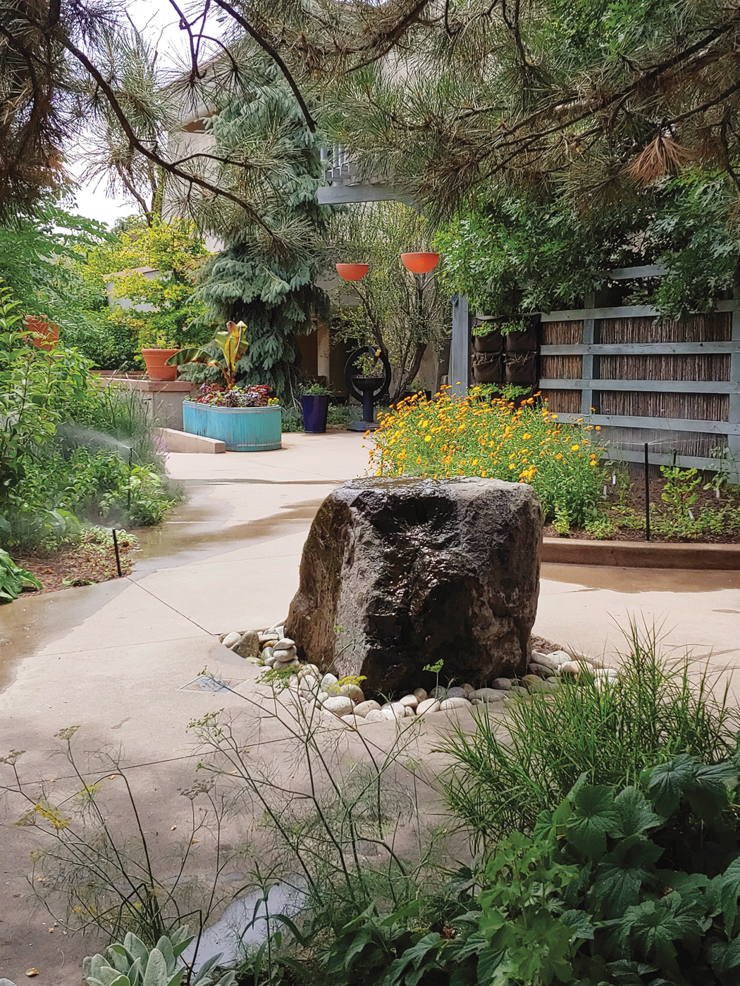 Garden water feature that looks like a stone