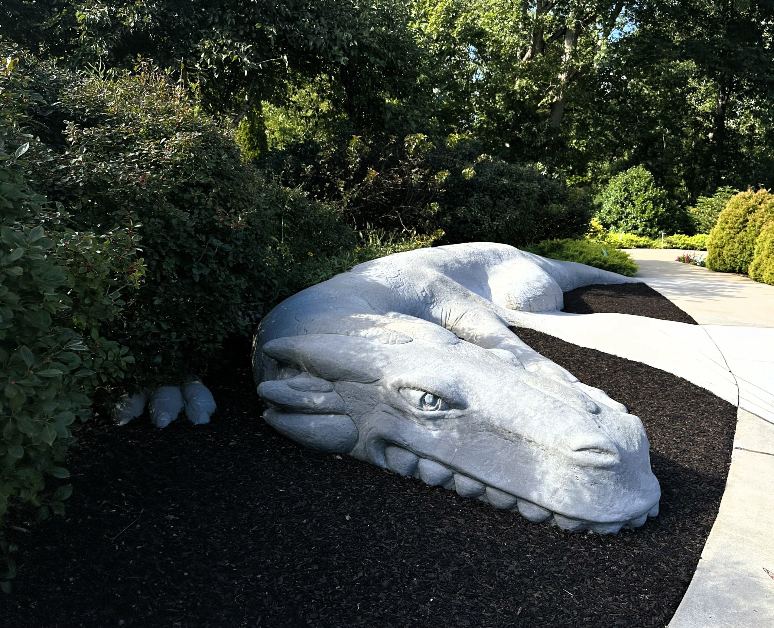 green dragon sculpture, Desmond the Dragon, garden art, woodland garden, trees, Atlanta Botanical Garden Gainesville