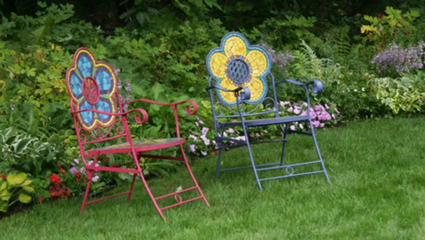 colorful garden chairs, red chair, blue chair, flower-shaped chairs, perennial garden, colorful hardscape