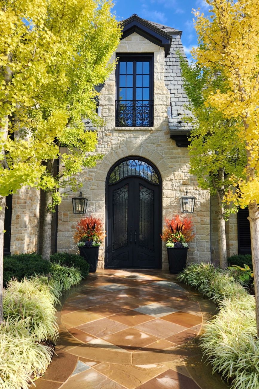 Ginkgo allée in autumn, golden yellow foliage, tree-lined entrance, matching fall container arrangements, Saddle River, New Jersey
