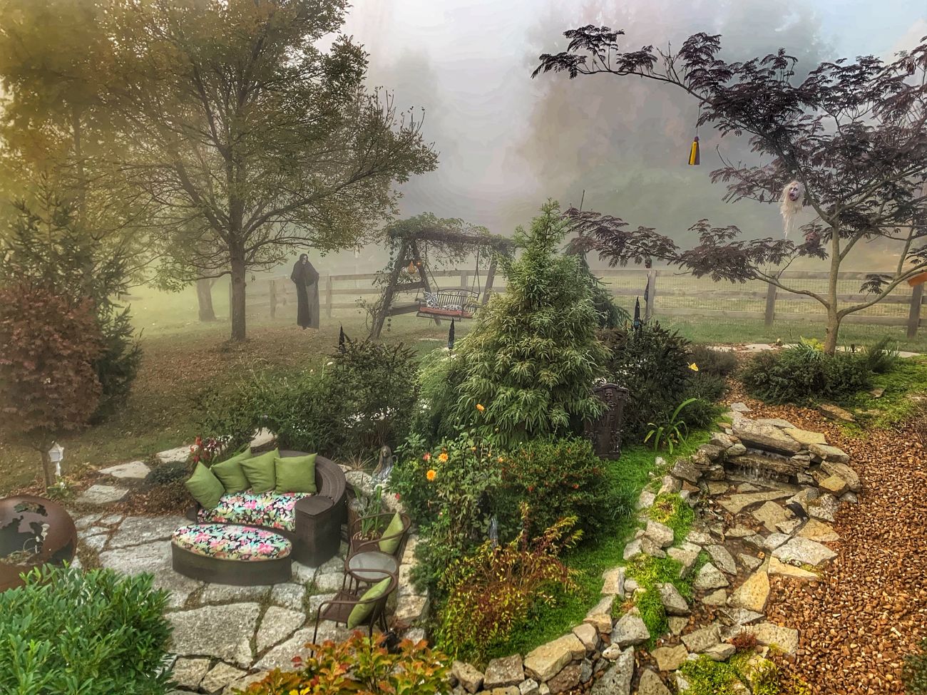 foggy garden sitting area, lush plants, Halloween garden, spooky garden, outdoor seating